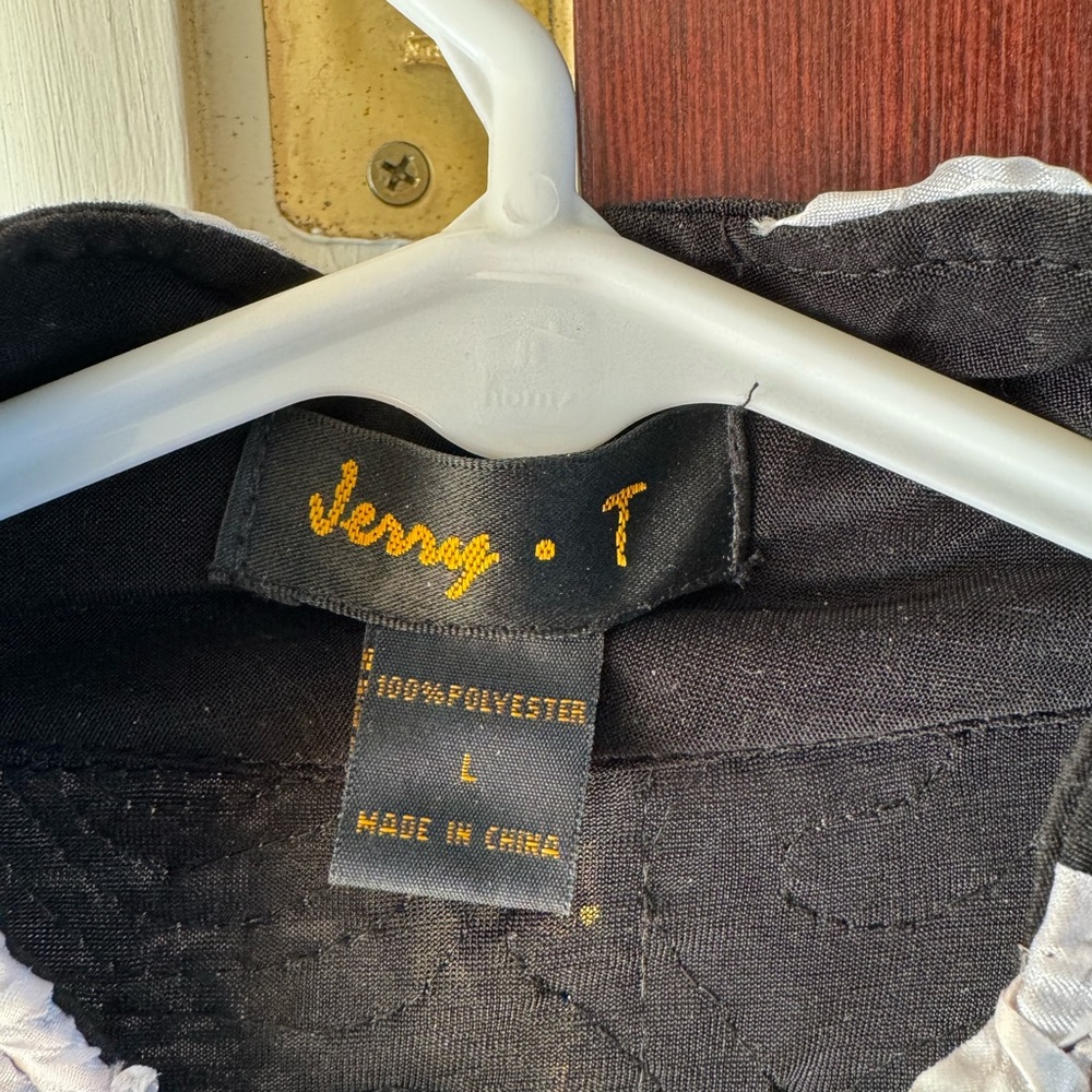 Size large light jacket with raised flowers